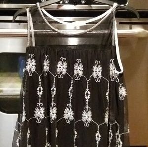 Top with sheer above chest,very nice